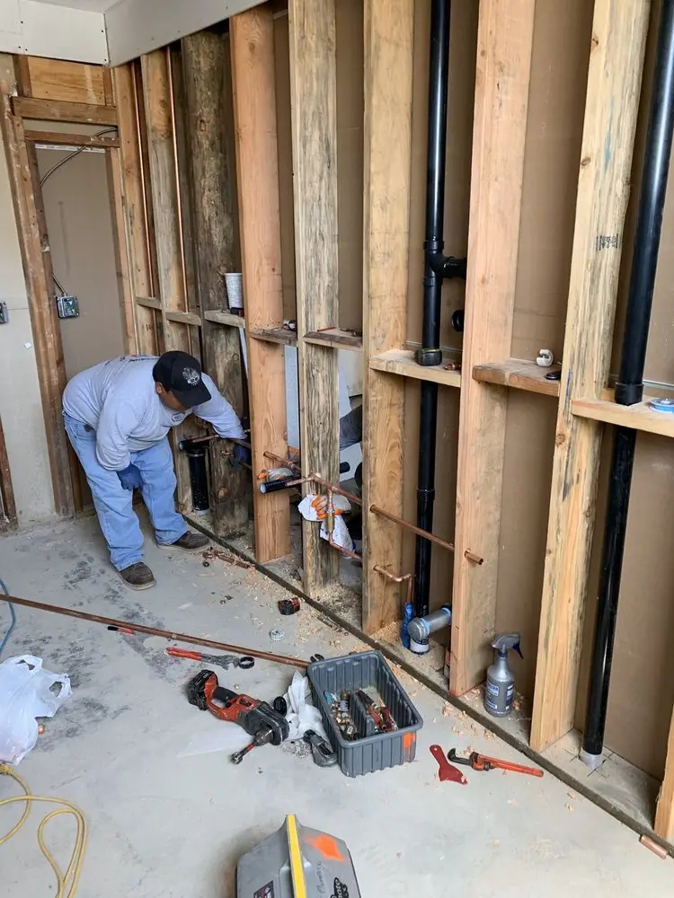 Commercial rough-in plumbing for Water Heater Replacement in Overton